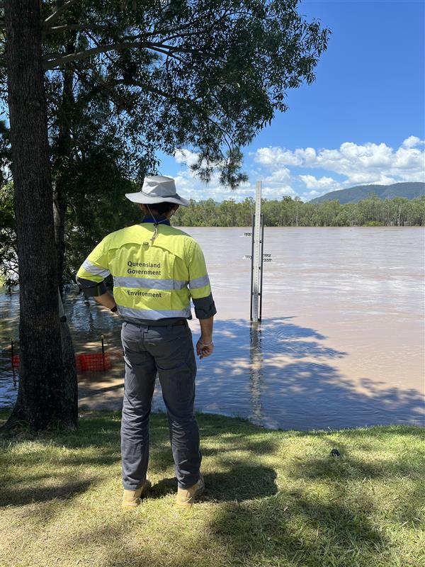 Photo of one of the Rockhampton officers monitoring the Fitzroy River flood gauges, working with the local council and emergency services in the wake of ex-Tropical Cyclone Koji.